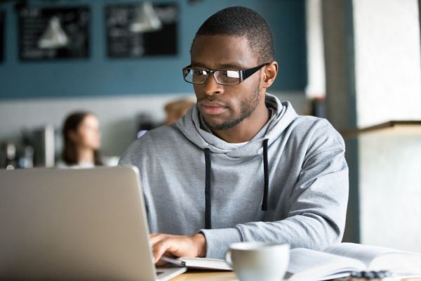 Focused student studying online